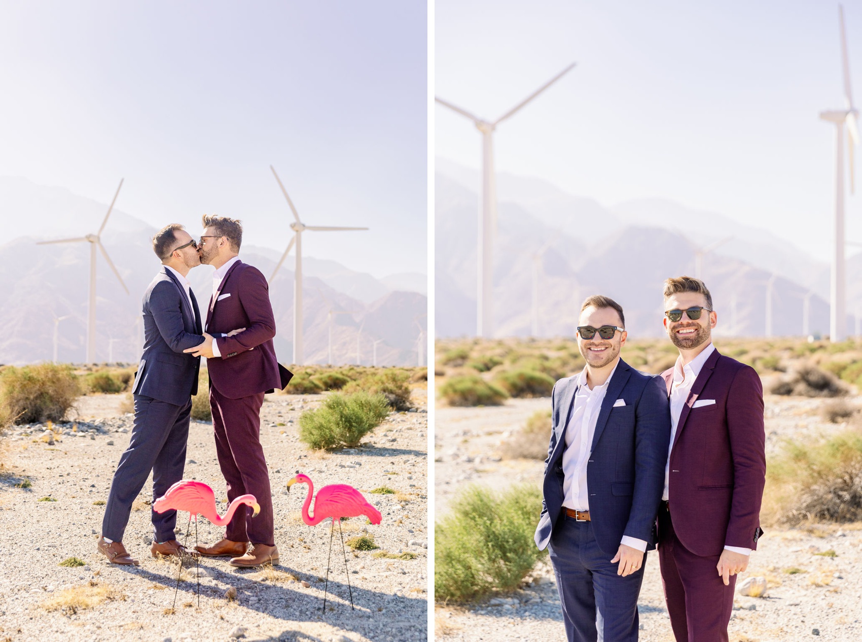 A happy engaged couple kisses in a desert over pink flamingos next to them standing near windmills captured by a palm springs engagement photographer