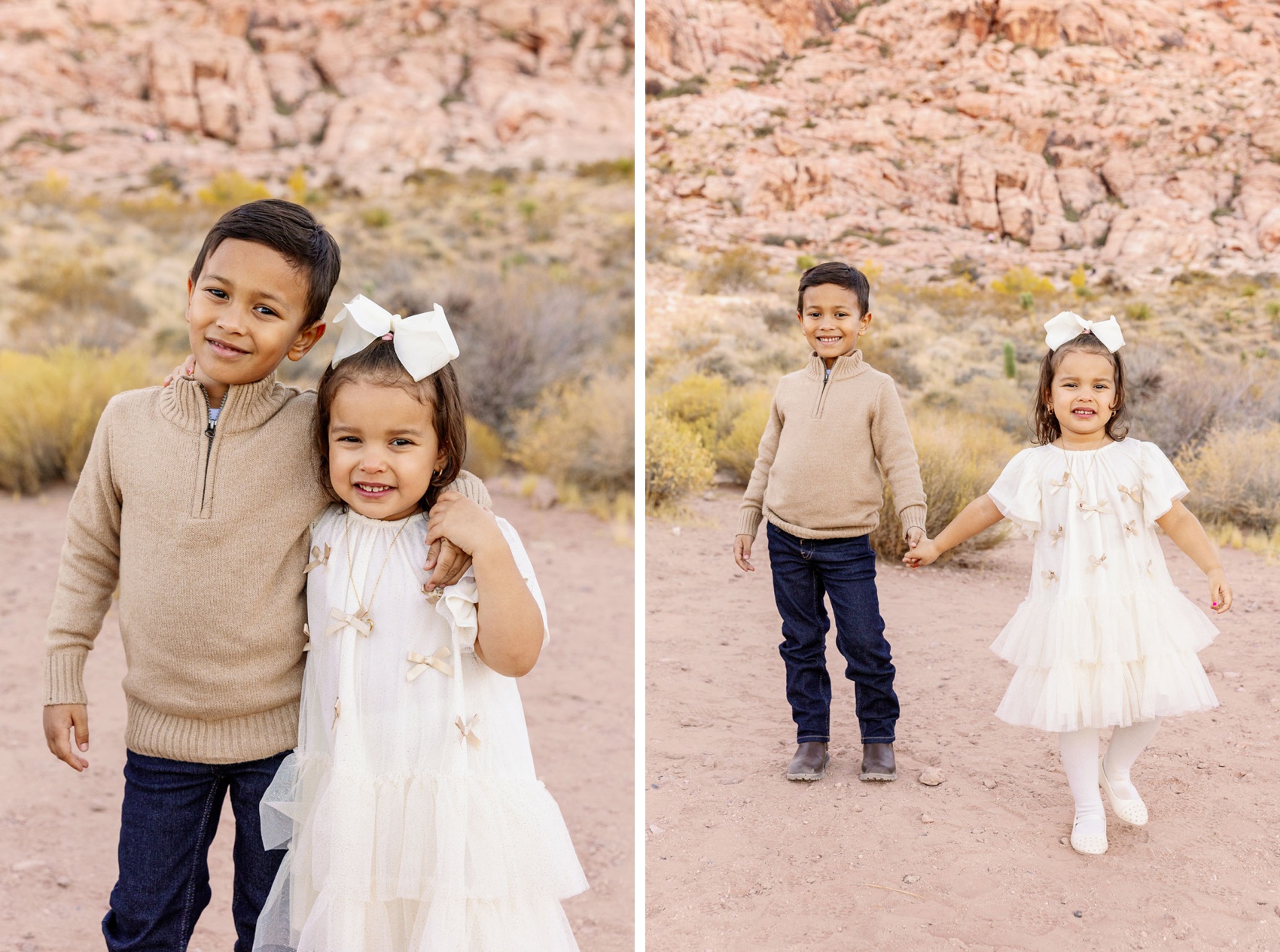 Toddler brother and sister play and laugh in the desert during their family photos in las vegas in a tan sweater and white dress
