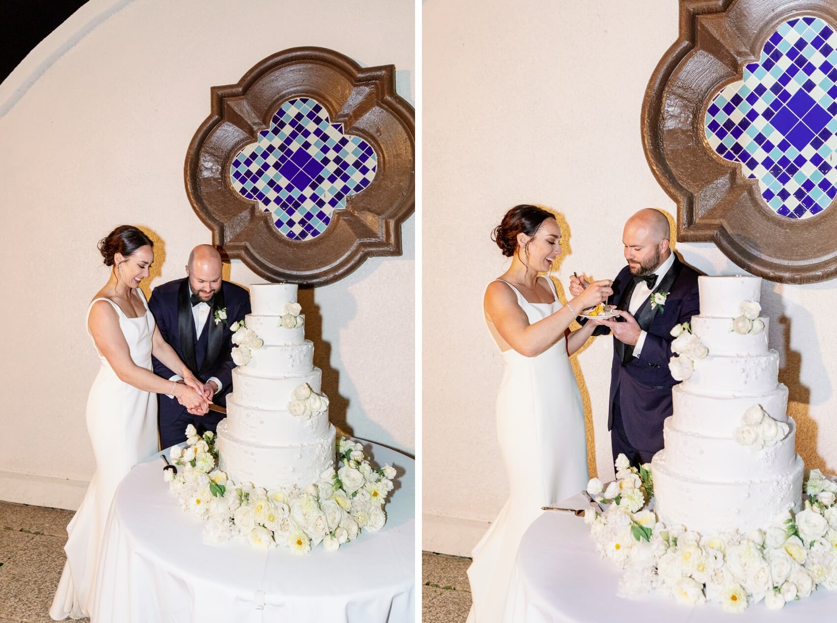 Newlyweds cut and eat some of their 6 tier cake