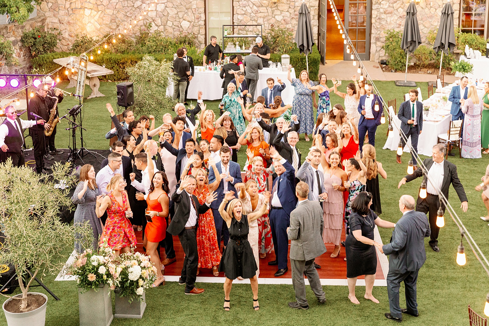 A look down at an active dance floor in the lawn of the lodge at sonoma wedding venue