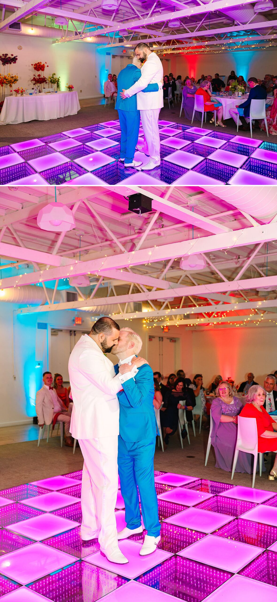 Newlyweds in white and blue suits dance and kiss on a pink dance floor as guests watch during their the saguaro palm springs wedding